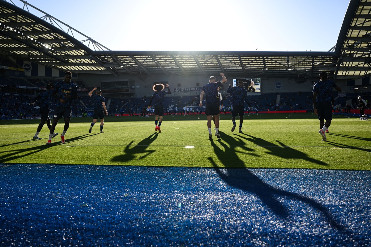 Chelsea's players warm up prior to the English Premier League football match between Brighton and Hove Albion and Chelsea at the American Express Community Stadium in Brighton, southern England on May 15, 2024. (Photo by Glyn KIRK / AFP)
