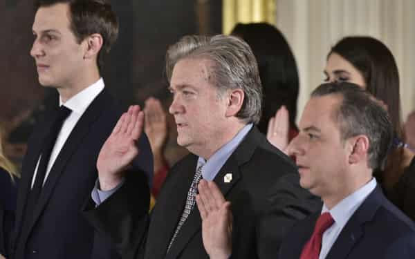 US President Donald Trump swears in senior staff at the White House