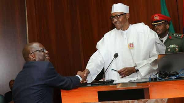Buhari swears in new perm secs