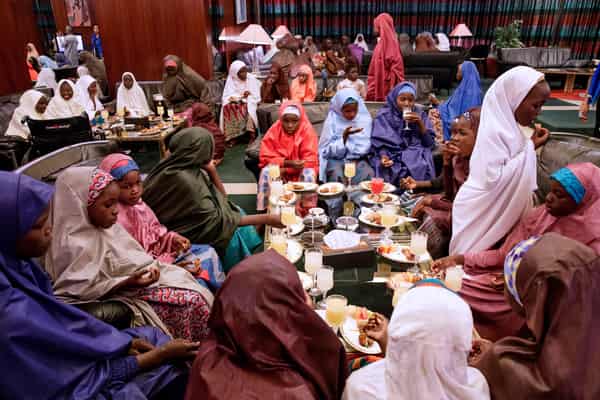 Some of the newly released Dapchi schoolgirls gather during their meeting with Nigeria’s President Muhammadu Buhari in Abuja