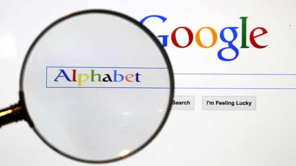 FILE PHOTO: A Google search page is seen through a magnifying glass in this photo illustration taken in Berlin