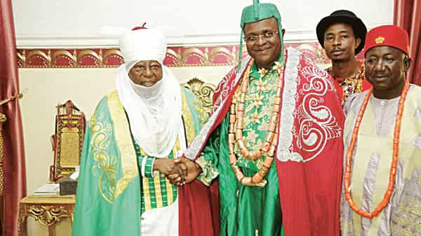 Emir of Zazzau, HRH Alhaji (Dr) Shehu Idris in a warm handshake with HRH Appolus Chu to his place in Zaria, Kaduna State
