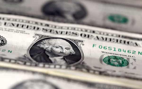 U.S. dollar notes are seen in this picture illustration