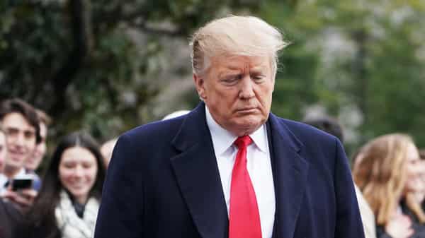 US President Donald Trump departs the White House