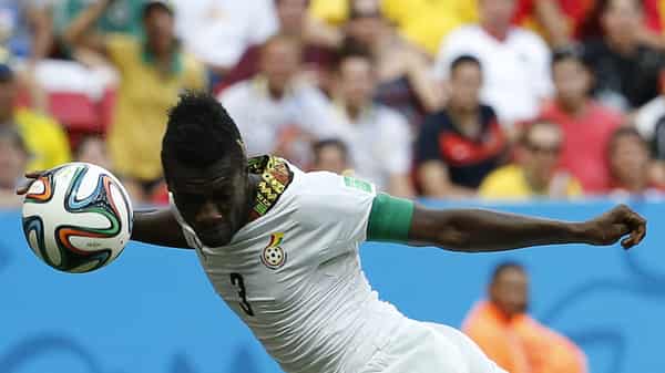 Ghana’s Gyan heads to score against Portugal during their 2014 World Cup Group G soccer match at the Brasilia national stadium in Brasilia
