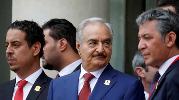 FILE PHOTO: Khalifa Haftar, the military commander who dominates eastern Libya, leaves after an international conference on Libya at the Elysee Palace in Paris