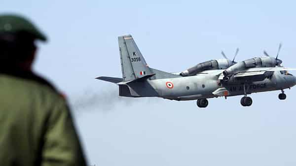 FILE PHOTO: A soldier stands guard as an Indian Air Force AN-32 transport aircraft carrying security personnel takes-off from the technical airport in Jammu