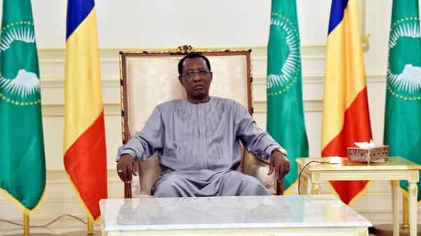 Chad’s President Idriss Deby Itno sits in an armchair at the presidential palace prior to his meeting with French Prime Minister in N’Djamena