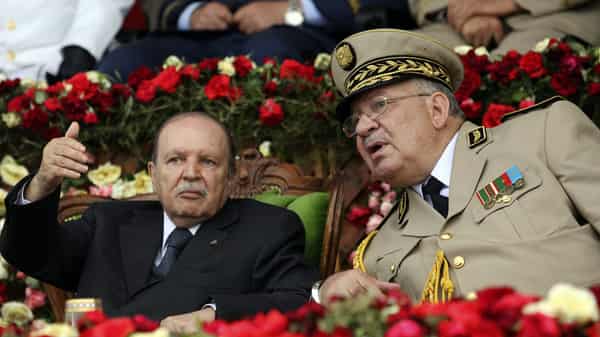 Algeria’s President and head of the Armed Forces Abdelaziz Bouteflika gestures during a graduation ceremony of the 40th class of the trainee army officers at a Military Academy in Cherchell