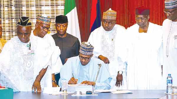 Buhari-signsCCC