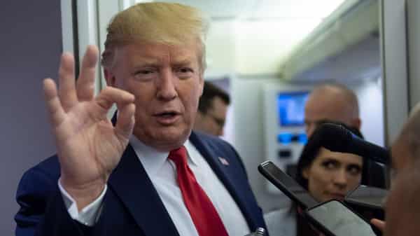 US President Donald Trump visits site of mass shooting