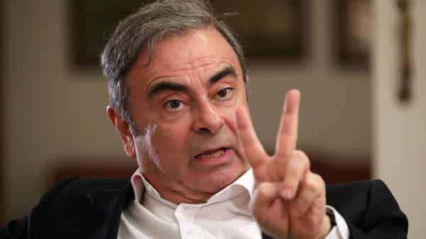 FILE PHOTO: Former Nissan chairman Carlos Ghosn talks during an exclusive interview with Reuters in Beirut
