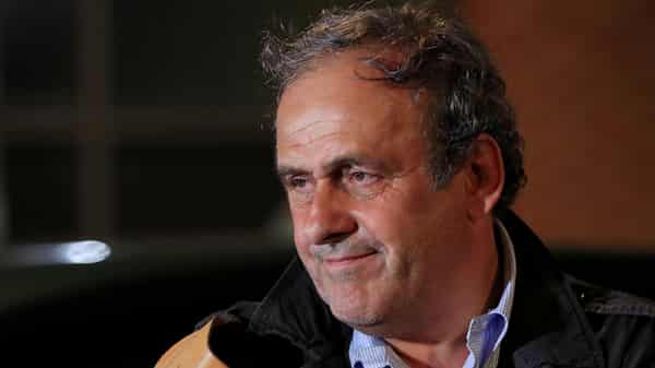 FILE PHOTO: Former head of European football association UEFA Michel Platini leaves a judicial police station where he was detained for questioning over the awarding of the 2022 World Cup soccer tournament, in Nanterre