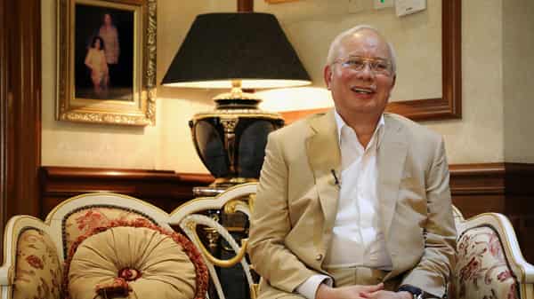 Malaysia’s former Prime Minister Najib Razak reacts during an interview with Reuters in Kuala Lumpur
