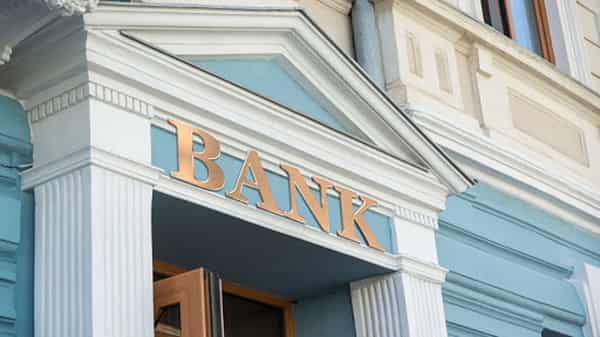 Bank sign on traditional europe building facade