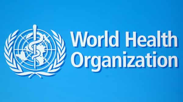 FILE PHOTO: A logo of the World Health Organization (WHO), is seen before a news conference in Geneva