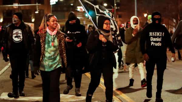 Protestors march after the New York grand jury votes not to indict officers in Prude’s death