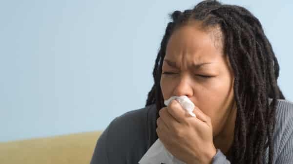 Coughing. Photo Shutterstock