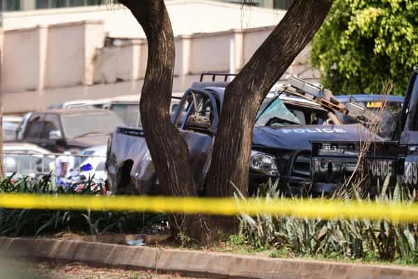 A general view shows wreckages of police vehicles at the scene of a blast in Kampala, Uganda November 16, 2021. REUTERS/Abubaker Lubowa