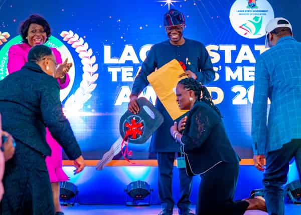 Sanwo-Olu presents car gift to outstanding teacher