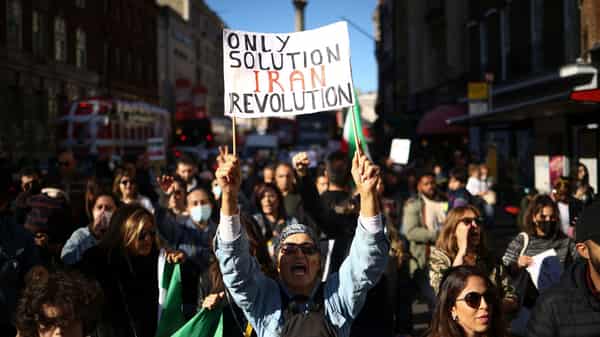 People protest in London against the Islamic regime of Iran following the death of Mahsa Amini