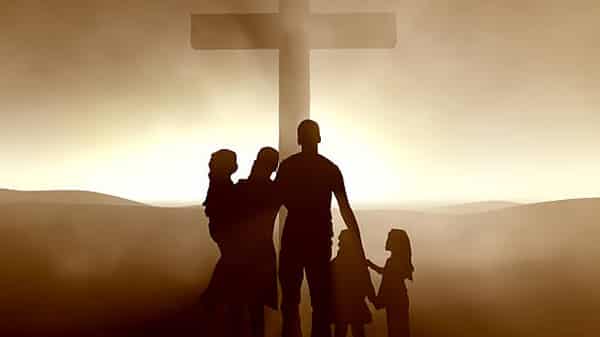 Silhouettes of a family at the Cross of Jesus Christ. High-resolution 3D.