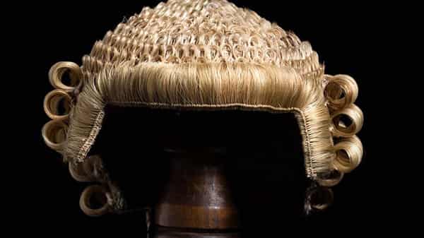 Front view of an antique horsehair lawyer’s wig