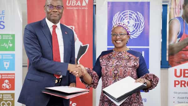 Chris-Ofikilu,-RCEO-UBA-West-Africa-and-MD-UBA-Ghana-in-a-photograph-with-Dr.-Angela-Lusigi,-UNDP-Resident-Representative-in-Ghana-exchanging-MoU-after-signing-ceremony-