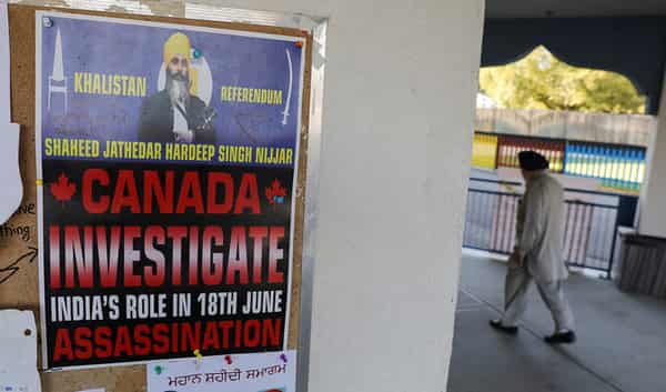 A sign asking for an investigation on India’s role in the killing of Sikh leader Hardeep Singh Nijjar is seen at the Guru Nanak Sikh Gurdwara temple, in Surrey