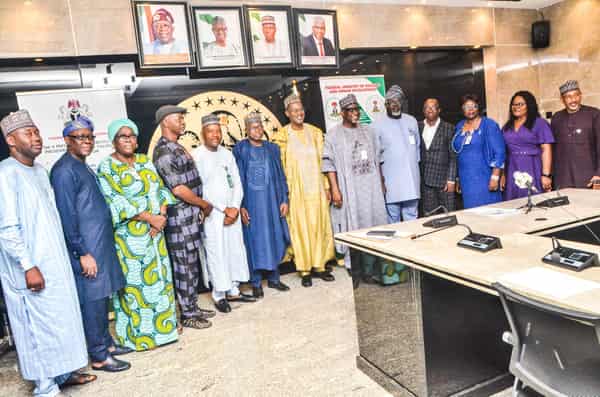 The Minister of Housing and Urban Development, Ahmed Dangiwa and the board of the Federal Mortgage Bank of Nigeria (FMBN)