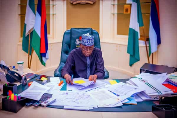 President-Tinubu signns