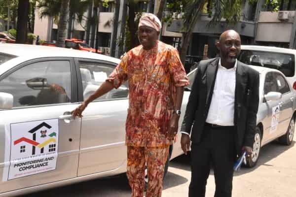 Caption  The Commissioner for Housing,  Moruf Akinderu-Fatai and Permanent Secretary of the Ministry of Housing, Abdulhafis Toriola during the inspection of vehicles provided for the Monitoring and Enforcement of law at government-owned estates