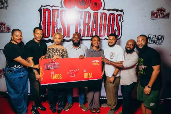L-R: Senior Brand Manager, Flavored Portfolio, Nigerian Breweries Plc, Onyebuchi Allanah; (winners of the Desperados all-expense-paid trip to elrow Festival in Ibiza) Moyosoreoluwa Christopher, Rhema Afamuefunah, Victor Amaechi, Chidera Mbaogu, Chukwuemeka Erivo; Portfolio Manager, Beyond Beer, Nigerian Breweries Plc, Sampson Oloche; and Director of Spektrum Entertainment, Delnoi Otsemobor; during the presentation of tickets to winners of the elrow Festival Ibiza Trip sponsored by Desperados Beer at Element House, held over the weekend at Livespot Entertarium, Lekki, Lagos.