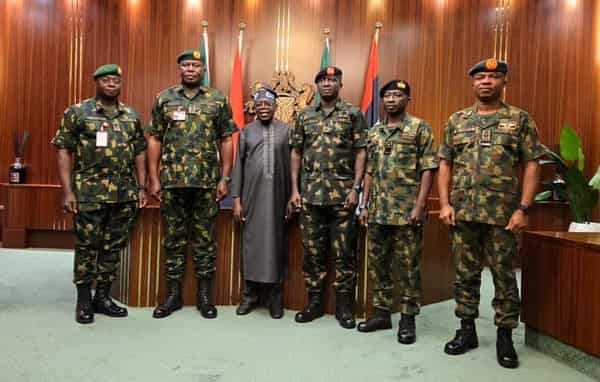 President Tinubu with the service chiefs with new ranks
