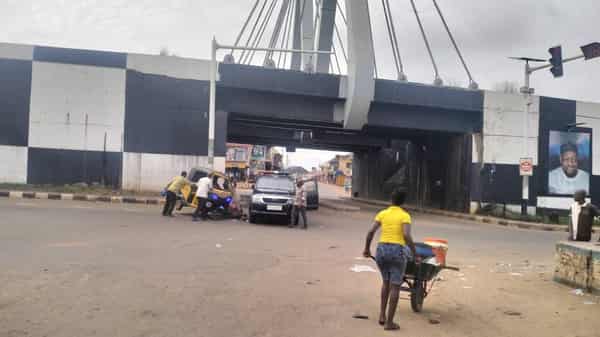 Tricycle Operator collided with a police van while attempting to escape arrest at the Aroma junction in Awka on Saturday