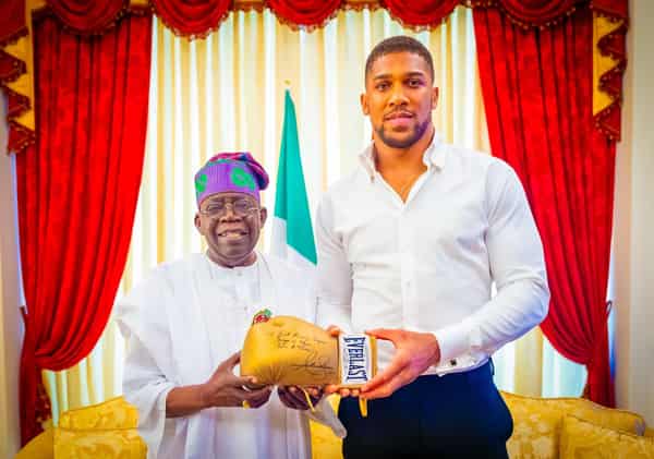 President Bola Tinubu and Anthony Joshua