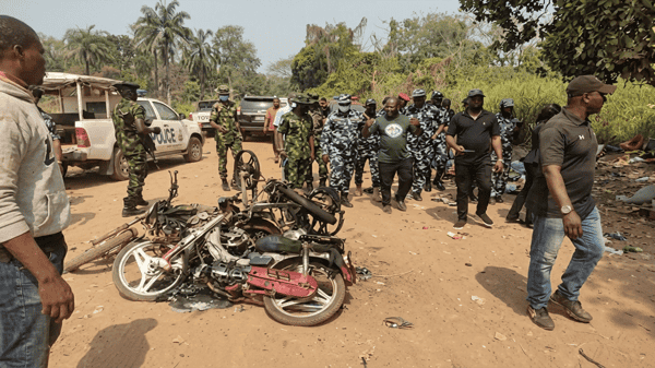 Some destroyed houses in the area and security operatives on ground