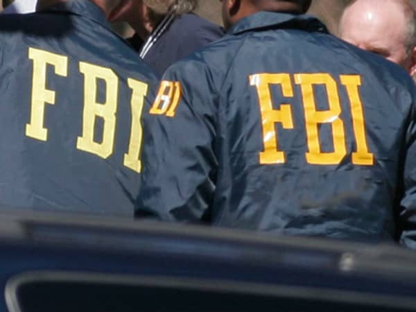 Brian Nichols escorted into FBI headquarters after arrest in Atlanta.