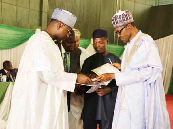 INEC PRESENTS CERTIFICATE OF RETURN TO GEN. BUHARI IN ABUJA_featured