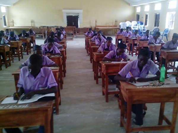 student writing exams