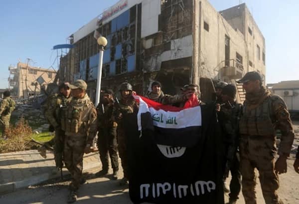 Iraq declares Ramadi liberated from IS, sweeps for bombs