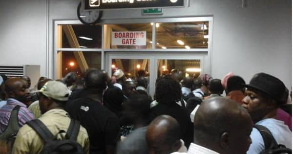 Stranded-Arik-passengers-blocking-boarding-gate-at-Abuja-Airport