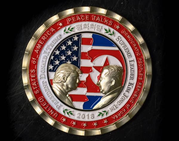 US-NKOREA-TRUMP-KIM-COIN
