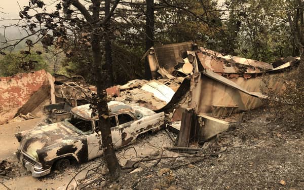 ‘Erratic’ winds, dry conditions fuel deadly California fires