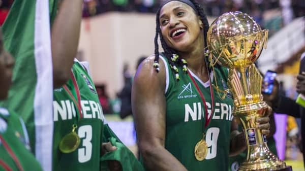 Aisha-Mohammed-and-Championship-Cup-696×464