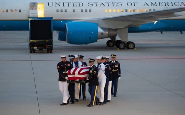 Senator John McCain’s casket arrives at the joint Base Andrews ahead of lying-in-state at the US capitol on Friday