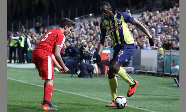 Bolt takes break from Australia football training