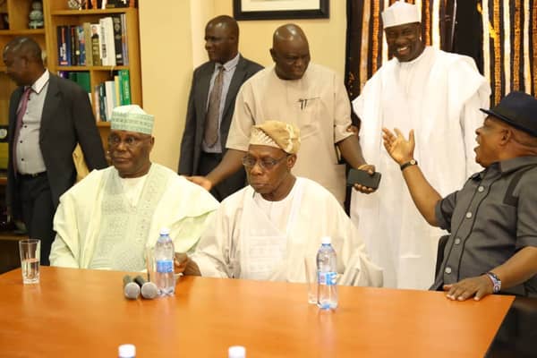 Former vice president Abubakar Atiku, former president Olusegun Obasanjo, PDP national chairman Uche Secondus