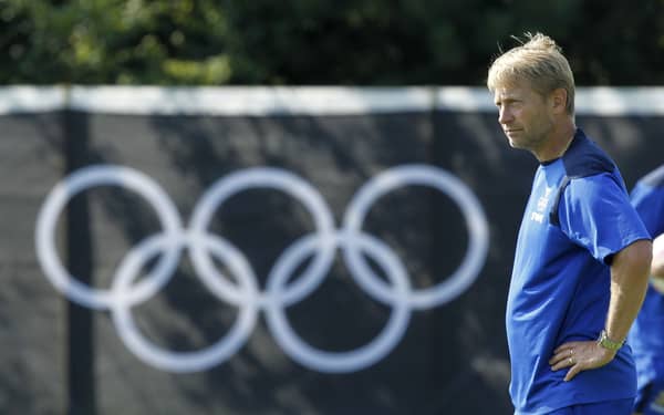 Sweden’s coach Thomas Dennerby watches his women’s soccer team members practice during a training session at the London 2012 Olympic Games in Coventry