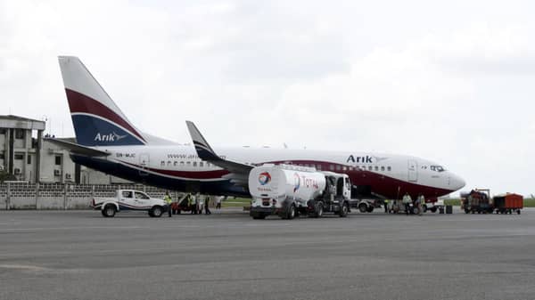Boeing 737-7BD Arik Air aeroplane is seen parked on the tarmac at the local airport in Lagos